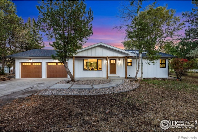 view of front of property with a garage