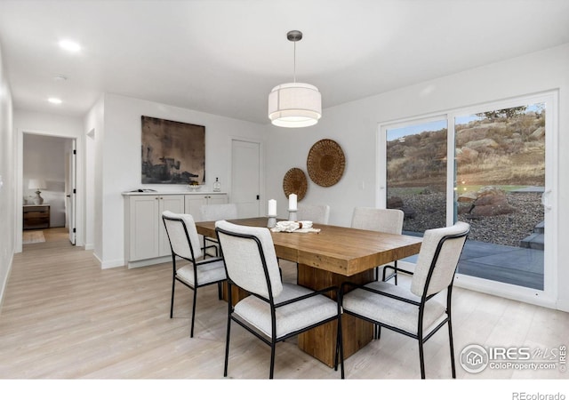 dining room with light hardwood / wood-style floors