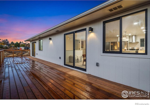 view of deck at dusk