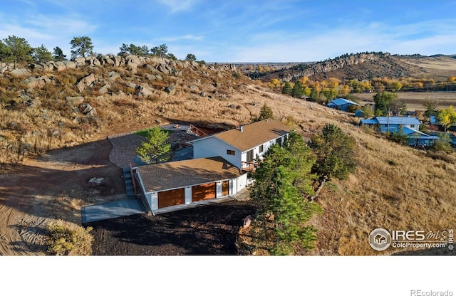 bird's eye view with a mountain view