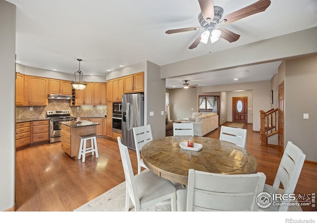 dining room featuring light hardwood / wood-style flooring