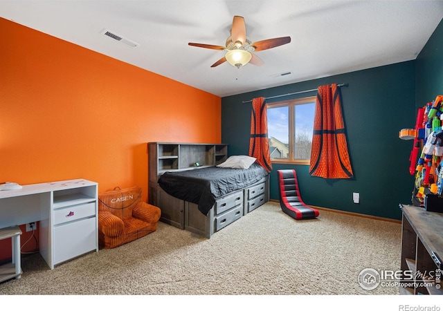 carpeted bedroom featuring ceiling fan