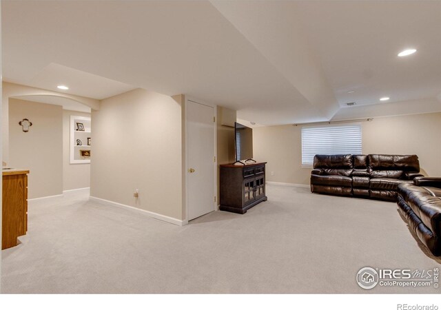 living room featuring light colored carpet