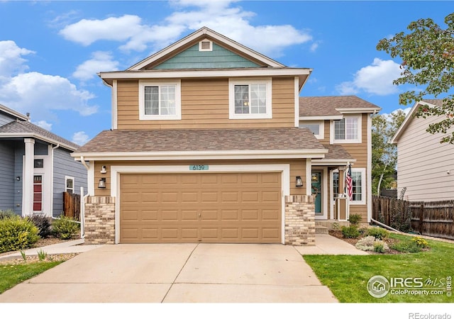 view of front of property featuring a garage