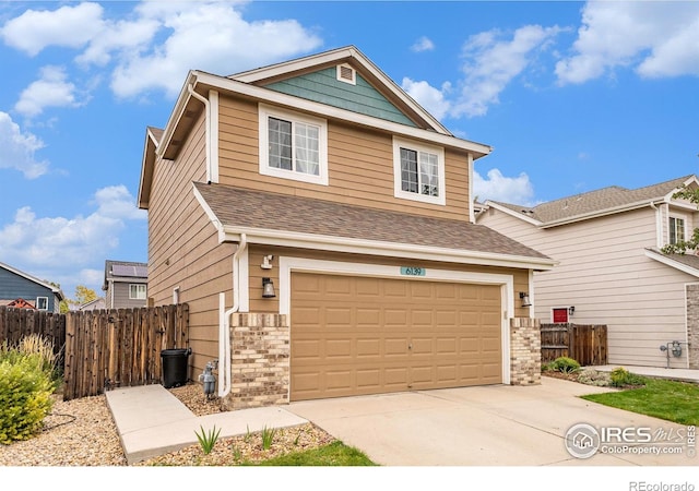 view of front of home with a garage