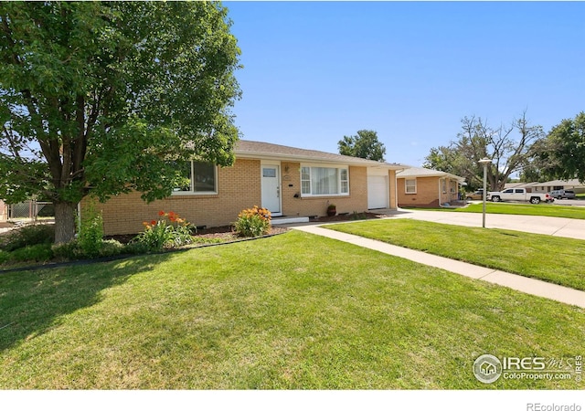 ranch-style home with a front lawn