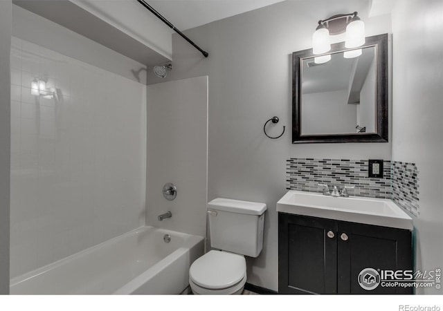 full bathroom featuring shower / bathing tub combination, vanity, tasteful backsplash, and toilet