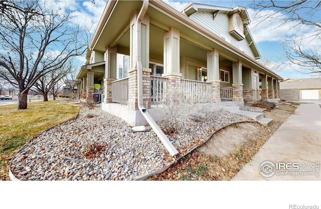 view of home's exterior with covered porch