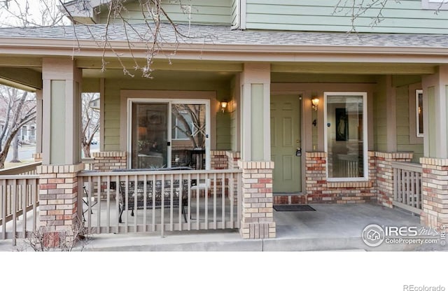 entrance to property with a porch