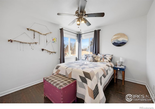 bedroom featuring ceiling fan and dark hardwood / wood-style flooring