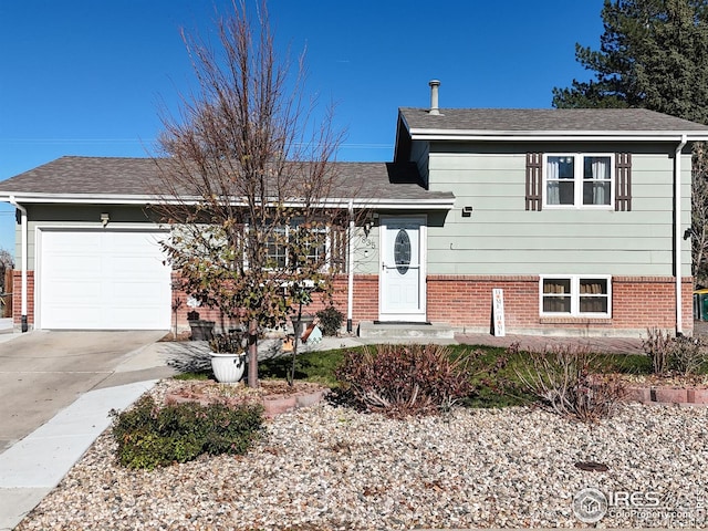 split level home with a garage