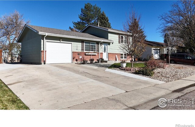 split level home featuring a garage