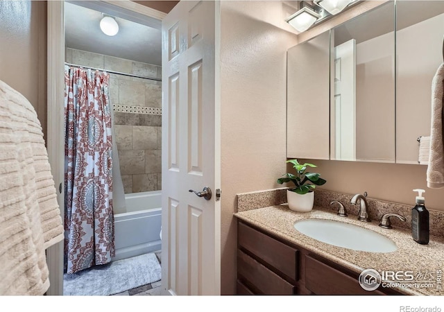 bathroom with vanity and shower / bath combination with curtain