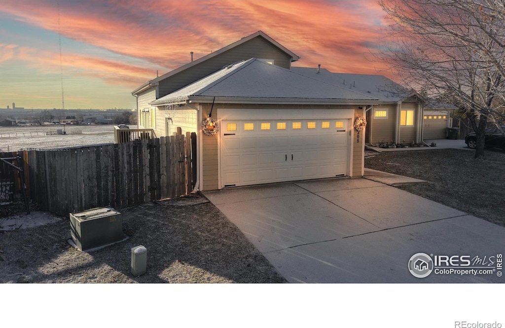 view of front of property with a garage