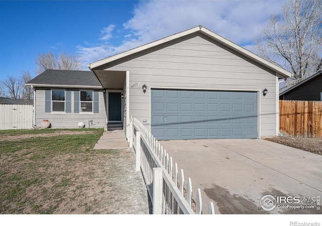 ranch-style house featuring a garage