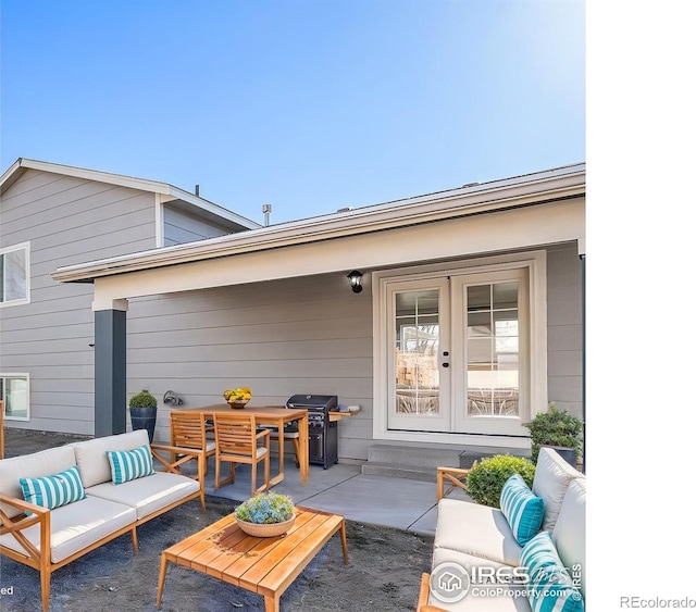 view of patio / terrace featuring an outdoor living space, area for grilling, and french doors