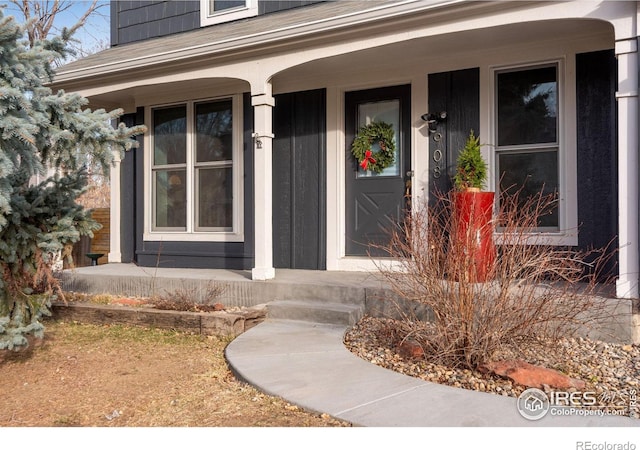 entrance to property with covered porch