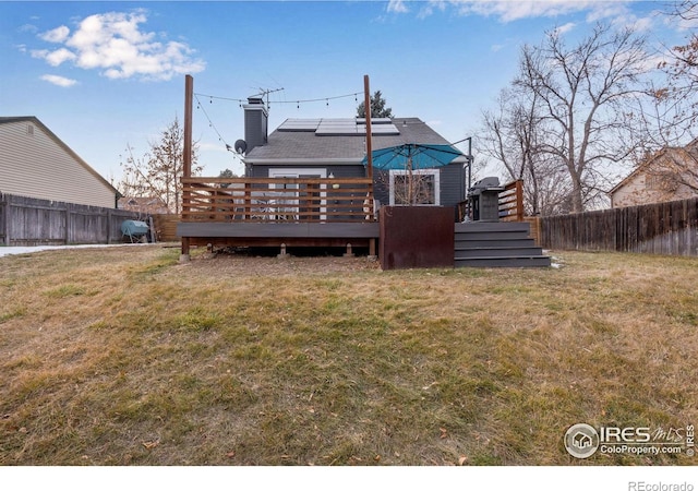 view of yard featuring a wooden deck