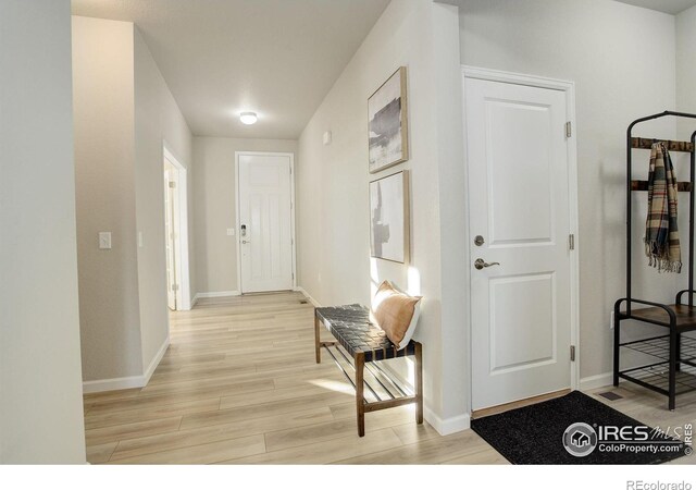 foyer featuring light hardwood / wood-style floors