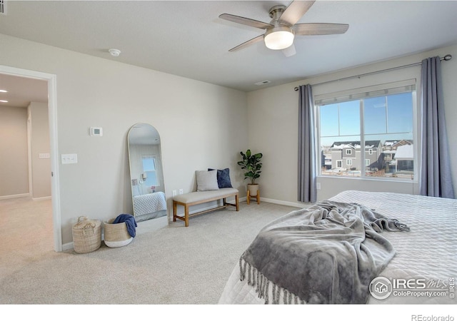 bedroom featuring ceiling fan and carpet floors