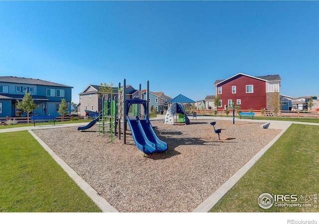 view of playground with a yard