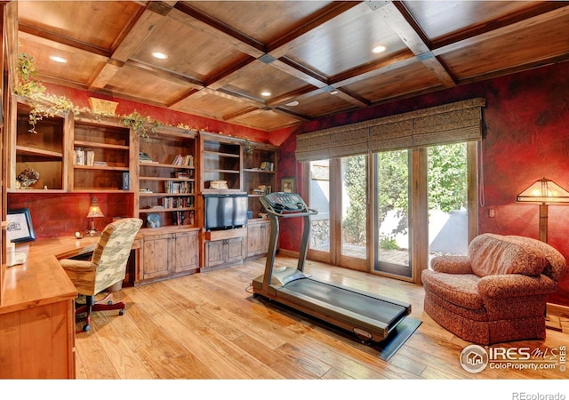 office area with french doors, light hardwood / wood-style floors, coffered ceiling, and beam ceiling