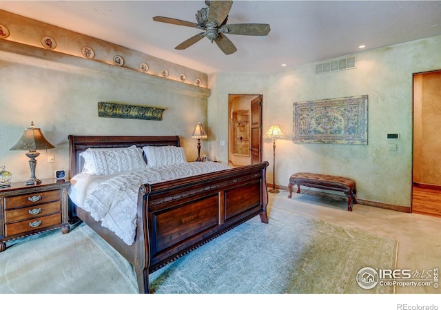 carpeted bedroom featuring ceiling fan