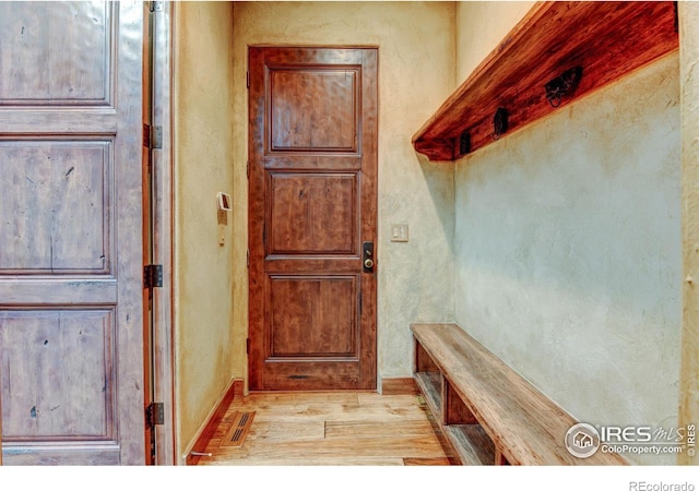 mudroom featuring light wood-type flooring