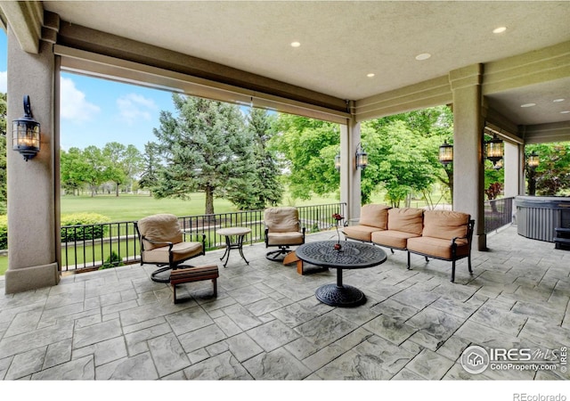 view of patio with an outdoor fire pit