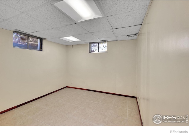 basement with a drop ceiling