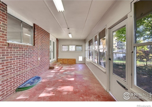 view of unfurnished sunroom