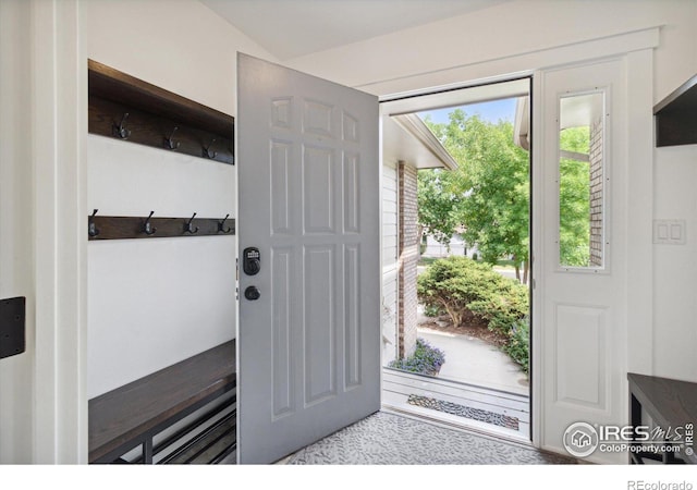 mudroom with vaulted ceiling