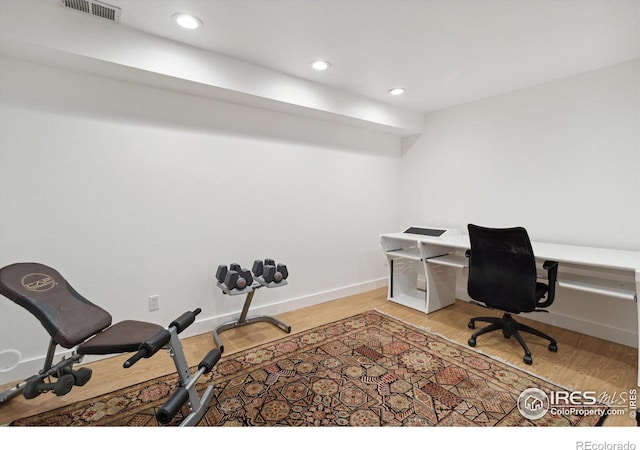 home office featuring light hardwood / wood-style flooring