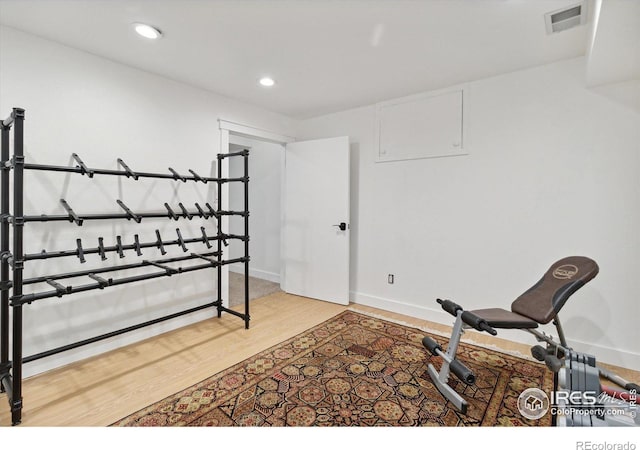 bedroom with hardwood / wood-style floors