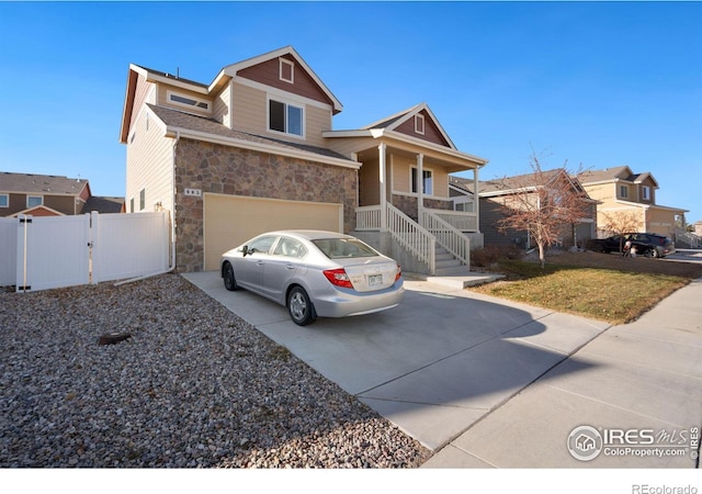 view of front of property featuring a garage and a front yard