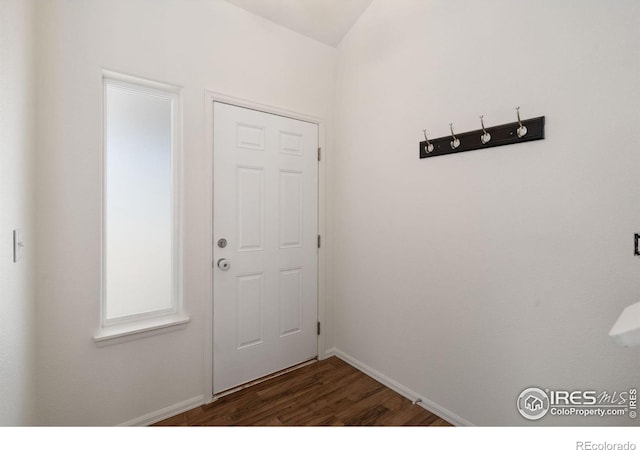 doorway featuring dark hardwood / wood-style floors