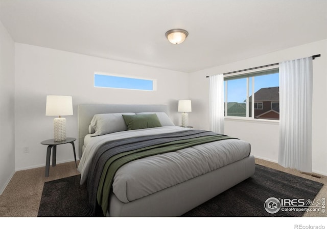 bedroom featuring carpet flooring and multiple windows