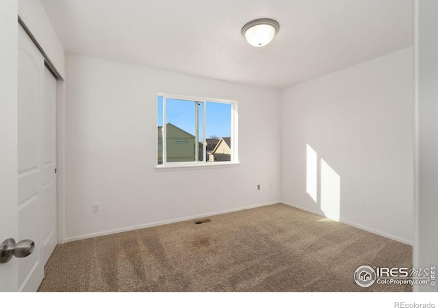 view of carpeted empty room