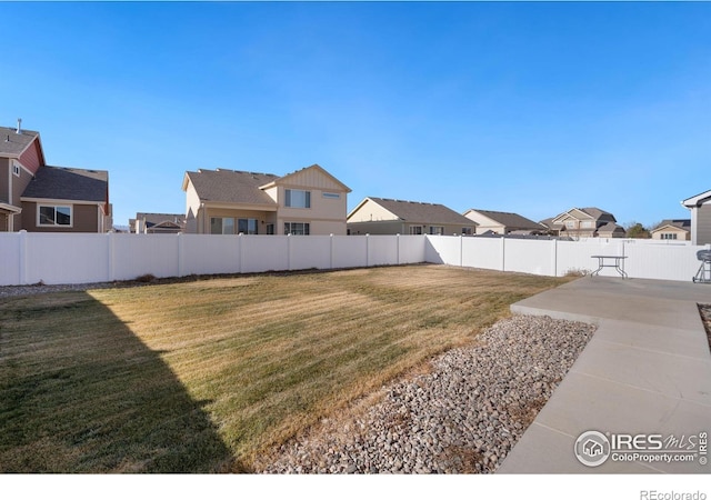 view of yard with a patio area