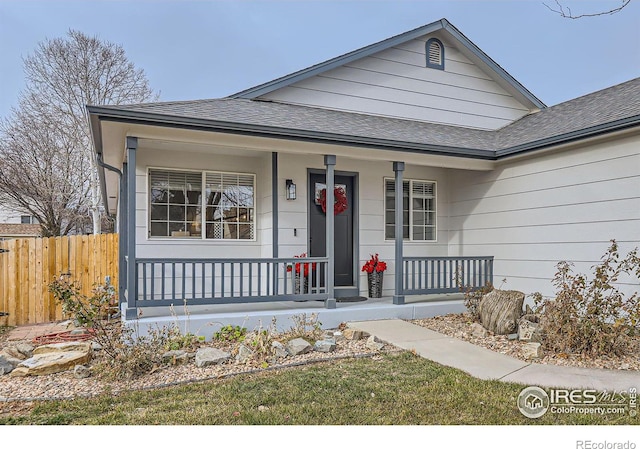 view of front of property featuring covered porch