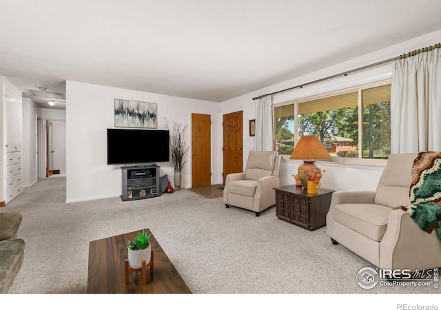 living room with light colored carpet