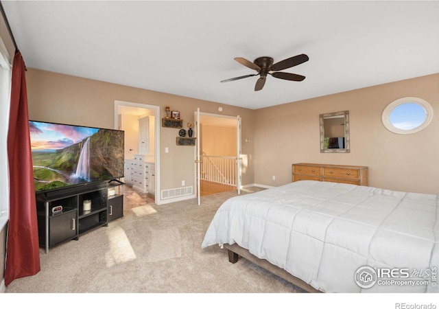 bedroom featuring ceiling fan and light colored carpet