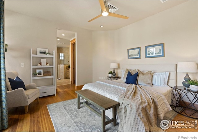 bedroom featuring ceiling fan and hardwood / wood-style floors