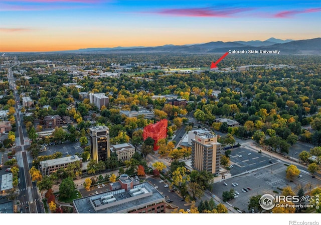 aerial view at dusk with a mountain view