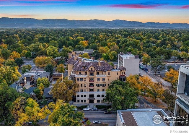 aerial view at dusk with a mountain view