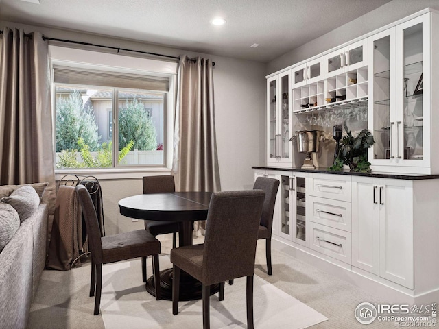 view of carpeted dining area