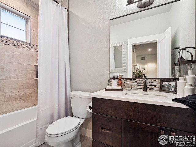 full bathroom featuring vanity, tasteful backsplash, toilet, and shower / bathtub combination with curtain