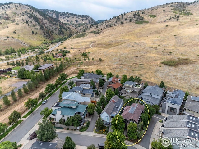 drone / aerial view featuring a mountain view