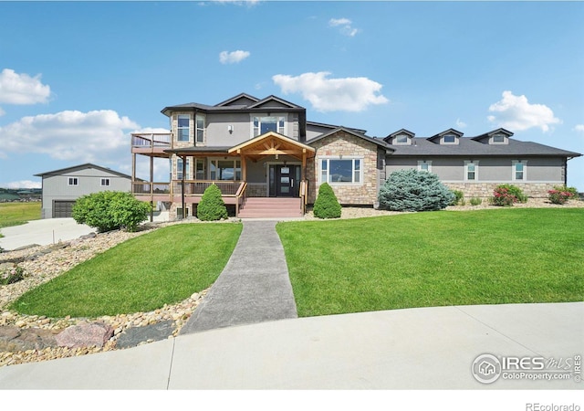 view of front of property with a porch and a front yard