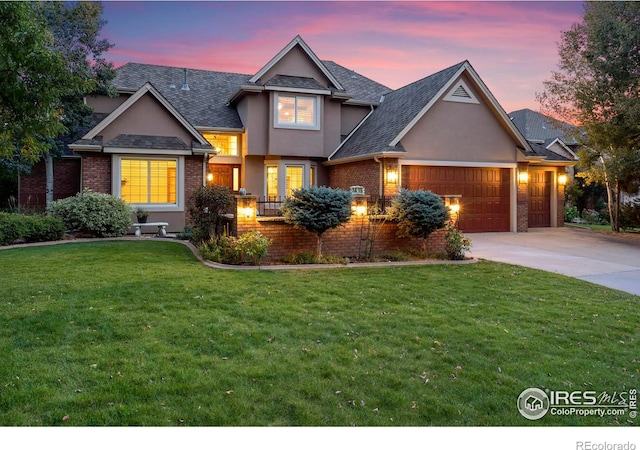 view of front of home with a lawn